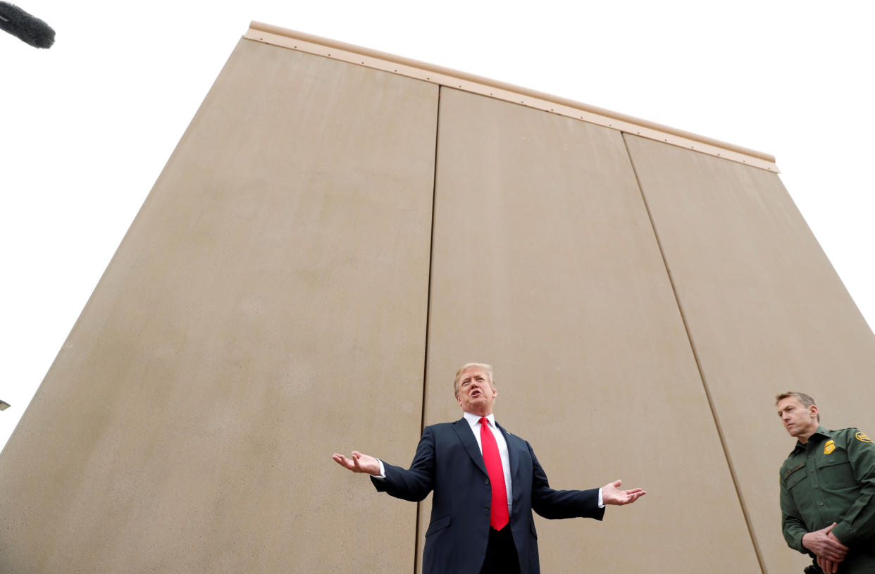 President Donald Trump speaks at an installation of U.S.-Mexico border wall prototypes near the Otay Mesa Port of Entry in San Diego on Tuesday. (Photo: Kevin Lamarque / Reuters)