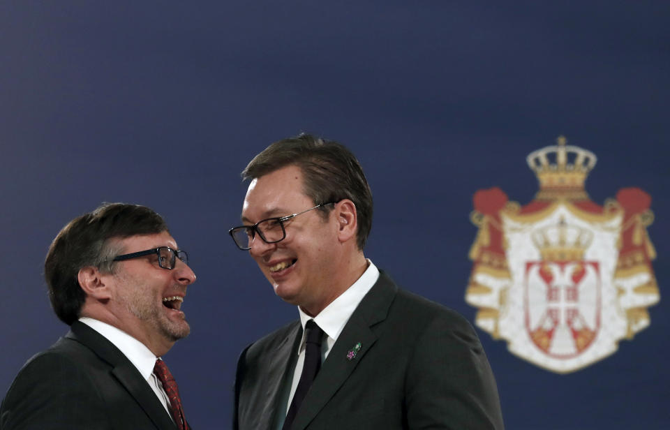 Matthew Palmer, Deputy Assistant Secretary of the U.S.Department of State - Bureau of European and Eurasian Affairs, left, speaks with Serbian President Aleksandar Vucic after a press conference in Belgrade, Serbia, Monday, Nov. 4, 2019. The U.S. has intensified efforts to help relaunch stalled talks on normalizing relations between Serbia and Kosovo, a former province whose 2008 declaration of independence Belgrade does not recognize. (AP Photo/Darko Vojinovic)