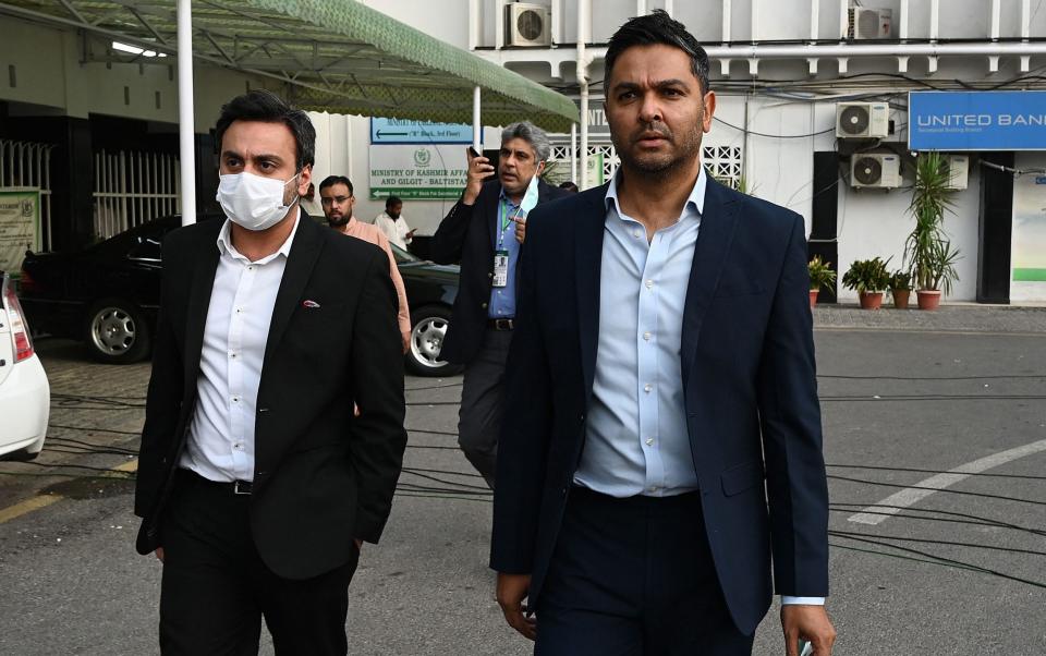 Chief Executive Officer of the Pakistan Cricket Board (PCB) Wasim Khan (R) leaves after meeting with Interior Ministery officials in Islamabad on September 17, 2021, after New Zealand postponed a series of one-day international (ODI) cricket matches against Pakistan over security concerns. - GETTY IMAGES