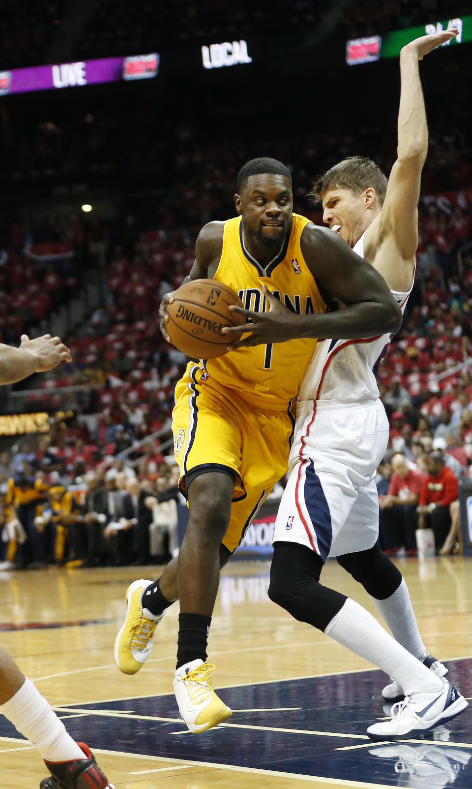 Indiana Pacers guard Lance Stephenson (1) drives against Atlanta Hawks guard Kyle Korver (26) in the first half of Game 6 of a first-round NBA basketball playoff series in Atlanta, Thursday, May 1, 2014. (AP Photo/John Bazemore)