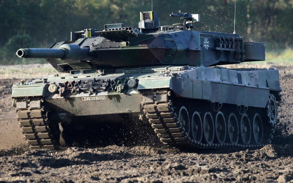 Rheinmetall, which makes the Leopard 2, says sales could almost double to €12bn within three years - AP Photo/Michael Sohn