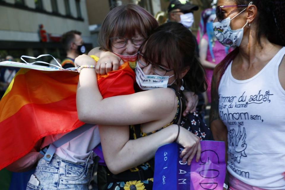 <p>Revellers embrace as they partake in the Berlin Pride festivities.</p>