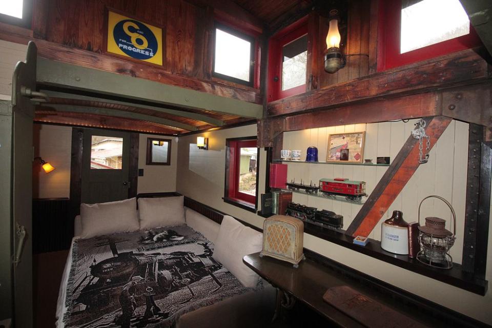 Next to the caboose is a grain silo that serves as a bath house for the rental. Reaves didn’t want to take up the space needed inside the caboose for it. The silo was found in a nearby kudzu-covered field.