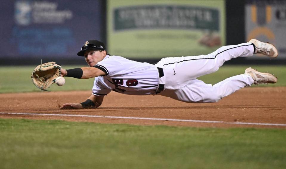 A ground ball is out of reach for Modesto Nuts thirdbaseman Brock Rodden during the California League playoff game with San Jose at John Thurman Field in Modesto, Calif., Tuesday, September 12, 2023.