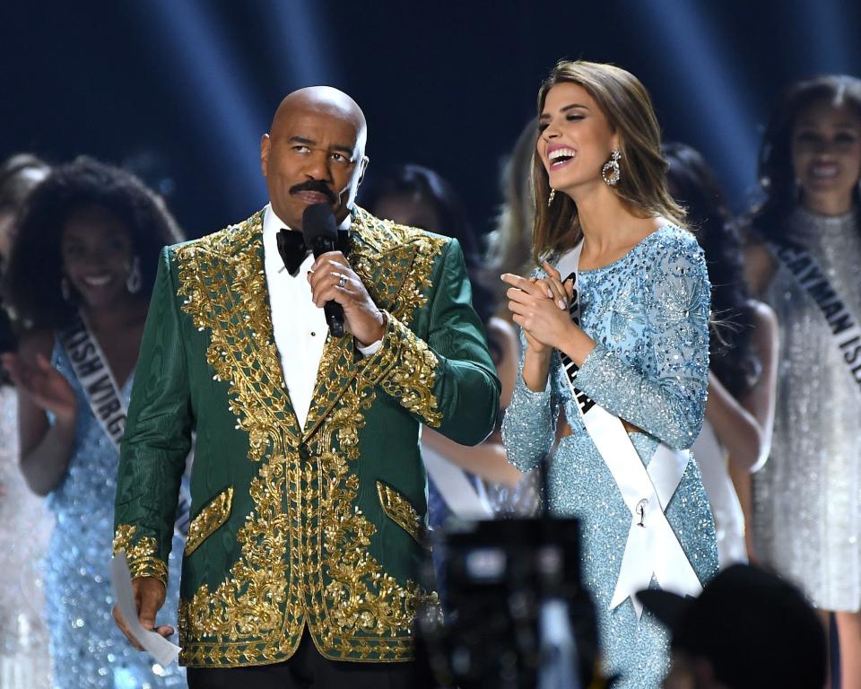 Steve Harvey and Miss Colombia at the Miss Universe pageant.