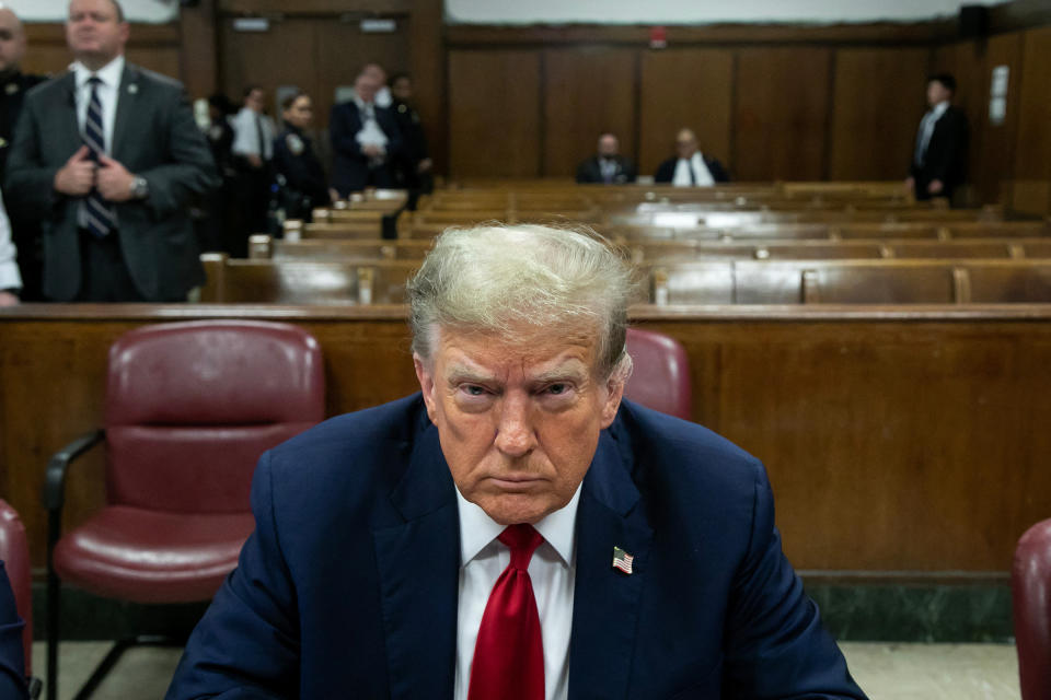 Former U.S. President Donald Trump attends the first day of his trial for allegedly covering up hush money payments linked to extramarital affairs, at Manhattan Criminal Court in New York City on April 15, 2024. <span class="copyright">Michael Nagle—POOL/AFP/Getty Images</span>