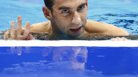 2016 Rio Olympics - Swimming - Final - Men's 200m Individual Medley Final - Olympic Aquatics Stadium - Rio de Janeiro, Brazil - 11/08/2016. Michael Phelps (USA) of USA reacts after winning. REUTERS/David Gray