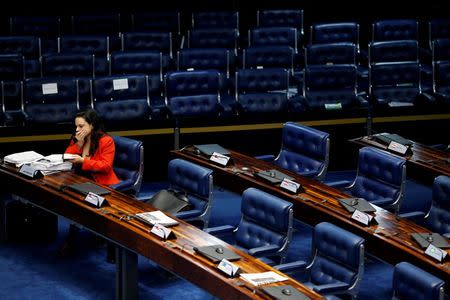 Jurist Janaina Paschoal, co-author of the complaint that originated the impeachment process against suspended president Dilma Rousseff, gestures during the final session of debate and voting on Rousseff's impeachment trial in Brasilia, Brazil August 26, 2016. REUTERS/Ueslei Marcelino