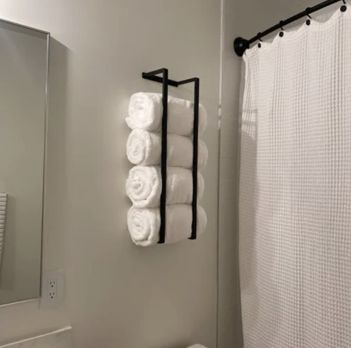 A reviewer's mounted towel rack