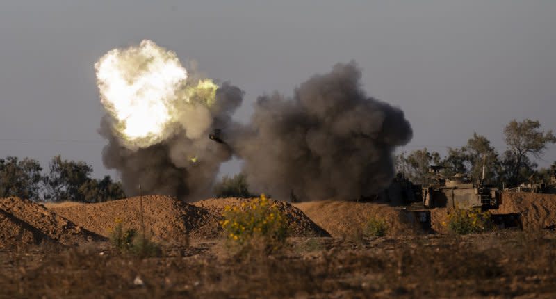 An Israeli 155mm self-propelled howitzer fires from southern Israeli into Rafah in the southern Gaza Strip on Tuesday. Photo by Jim Hollander/UPI