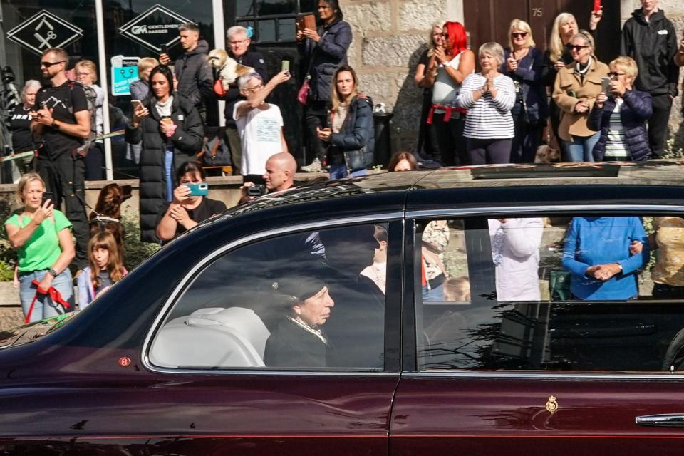 BANCHORY, SCOTLAND - SEPTEMBER 11: Princess Anne, Princess Royal travels in a vehicle behind the hearse carrying the coffin of Queen Elizabeth II on September 11, 2022 in Banchory, United Kingdom. Elizabeth Alexandra Mary Windsor was born in Bruton Street, Mayfair, London on 21 April 1926. She married Prince Philip in 1947 and ascended the throne of the United Kingdom and Commonwealth on 6 February 1952 after the death of her Father, King George VI. Queen Elizabeth II died at Balmoral Castle in Scotland on September 8, 2022, and is succeeded by her eldest son, King Charles III. (Photo by Peter Summers/Getty Images)