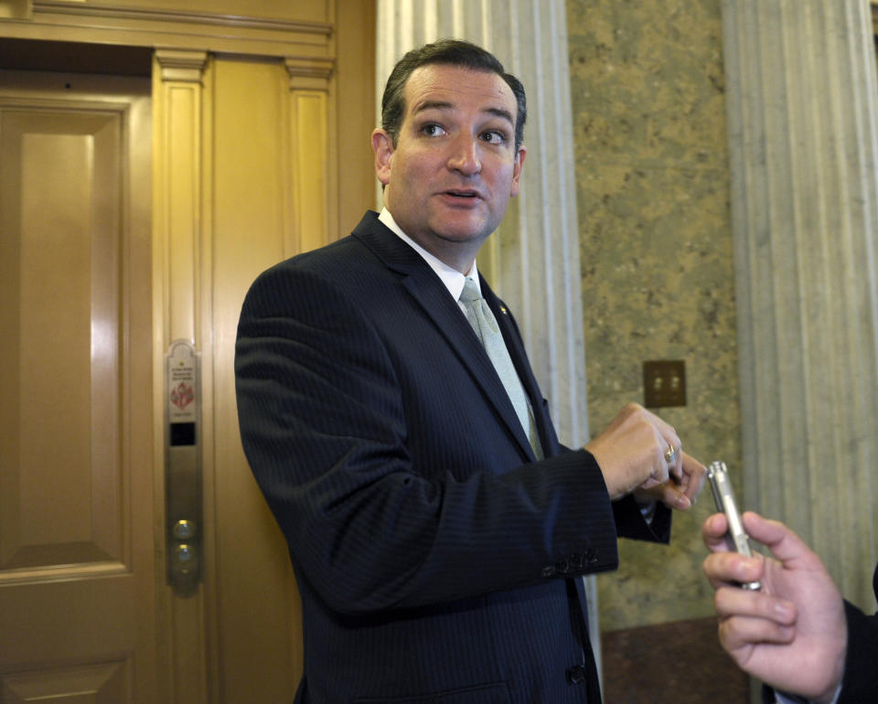 Sen. Ted Cruz, R-Texas talks with reporters following a vote on Capitol Hill in Washington, Wednesday, Oct. 9, 2013. (AP Photo/Susan Walsh)