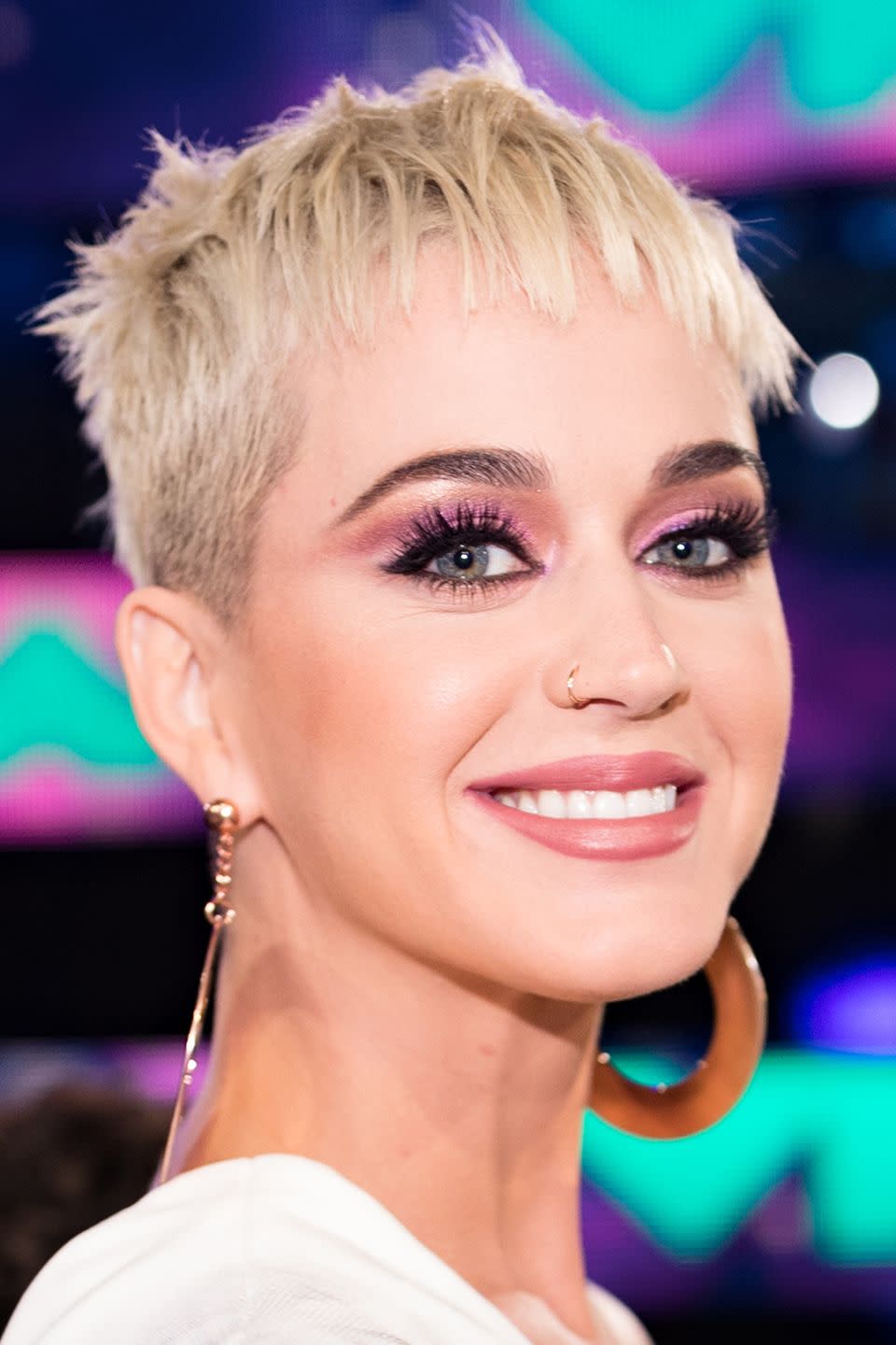 <p>Katy Perry has been sporting a platinum pixie cut lately, but it's hard not to think of her default hair color as almost-black.</p>