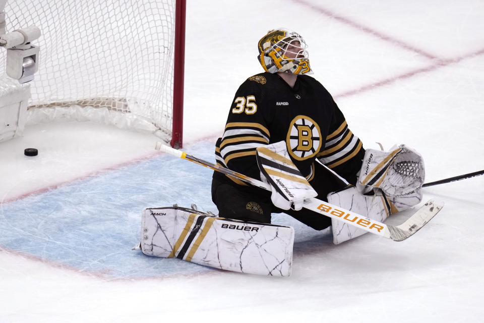 Boston Bruins goaltender Linus Ullmark reacts after giving up a tiebreaking goal to Carolina Hurricanes left wing Jordan Martinook during the third period of an NHL hockey game Wednesday, Jan. 24, 2024, in Boston. (AP Photo/Charles Krupa)