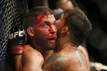 Jeremy Stephens (L) and Dennis Bermudez put on a show at UFC 189. (AP Photo/John Locher)
