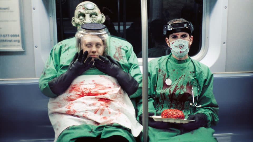 A couple of gory neurosurgeons. - Seymour Licht