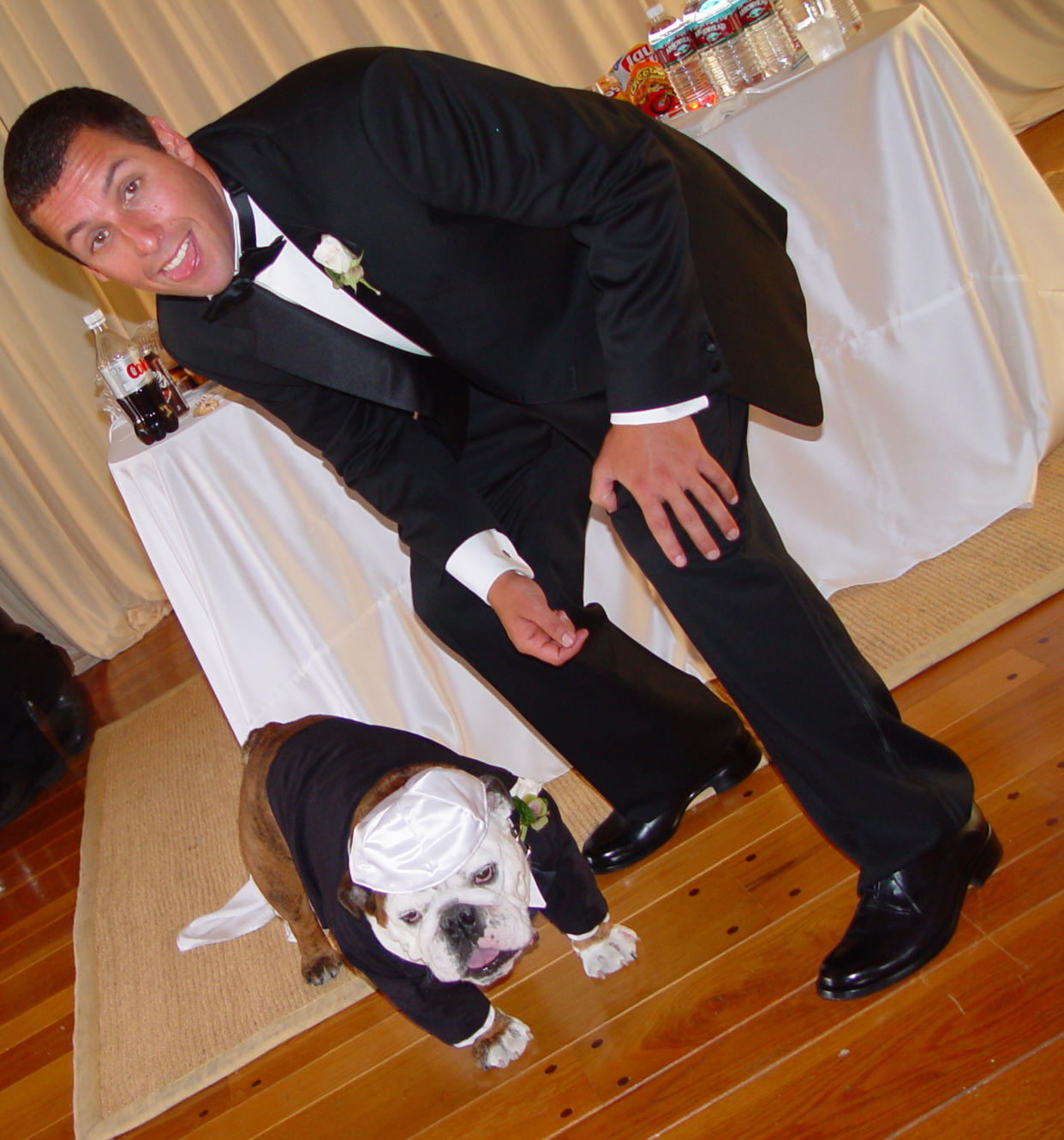 MALIBU, CA - JUNE 22:  Adam Sandler poses with his pet bulldog Meatball at his wedding June 22, 2003 in Malibu, California.  Sandler married model-actress Jackit Titone.  (Photo by Nick Gossen Courtesy of AdamSandler.com/Getty Images) 