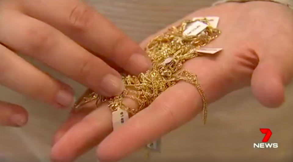 On Tuesday residents scooped up the jewellery from nearby streets and returned it. Source: 7News