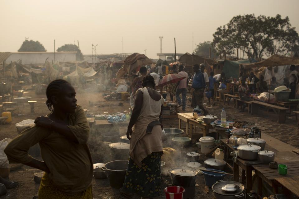 People are seen in a camp for internally dispersed persons at the airport of Bangui