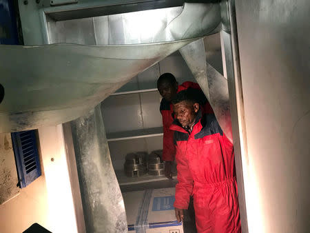 The first batch of 4,000 experimental Ebola vaccines to combat an outbreak is loaded into a fridge as it arrives at the airport in Kinshasa, Democratic Republic of Congo May 16, 2018. REUTERS/Benoit Nyemba