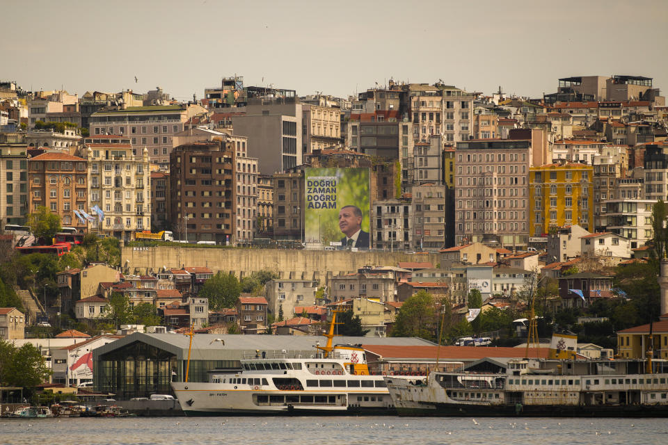 A giant election campaign billboard of Turkish President and People's Alliance's presidential candidate Recep Tayyip Erdogan is displayed in Istanbul, Turkey, Wednesday, May 3, 2023. (AP Photo/Emrah Gurel)