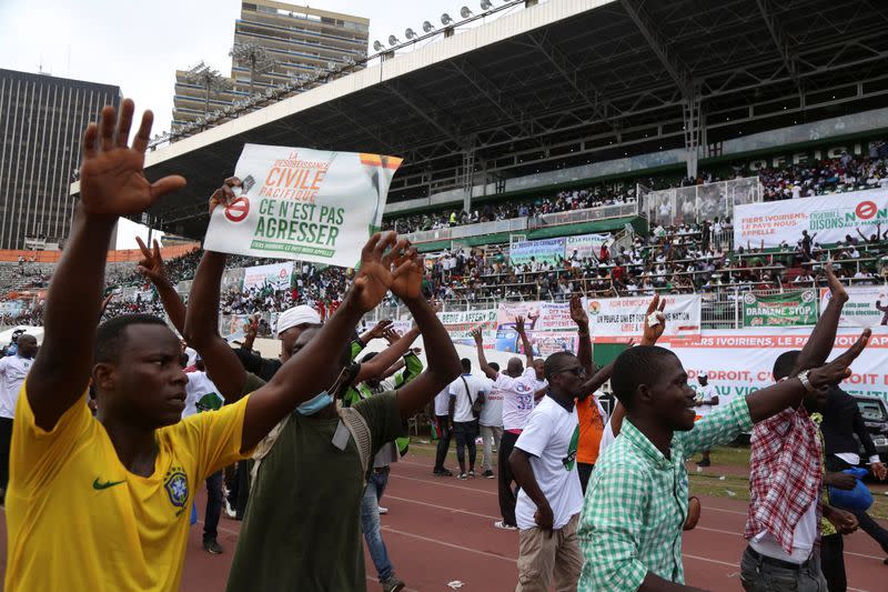 Supporters of Ivory Coast's opposition coalition parties gather during a stadium rally, in Abidjan