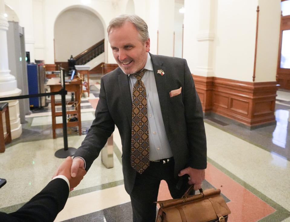 Sen. Bryan Hughes, R - MIneola, talks to a reporter as he leaves the Capitol after a break in deliberations the impeachment trial of Attorney General Ken Paxton at the Capitol on Friday September 15, 2023.