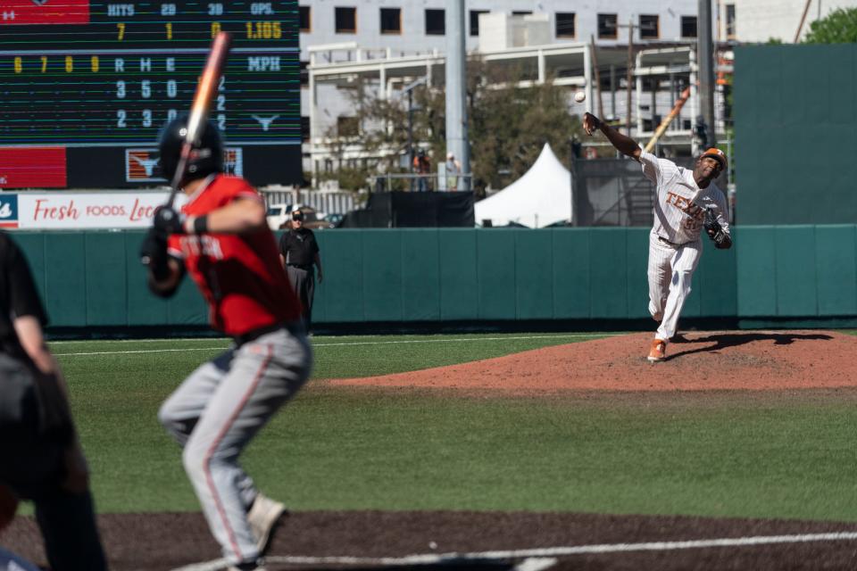 Texas pitcher Lebarron Johnson Jr. fires a pitch during a March game against Texas Tech.