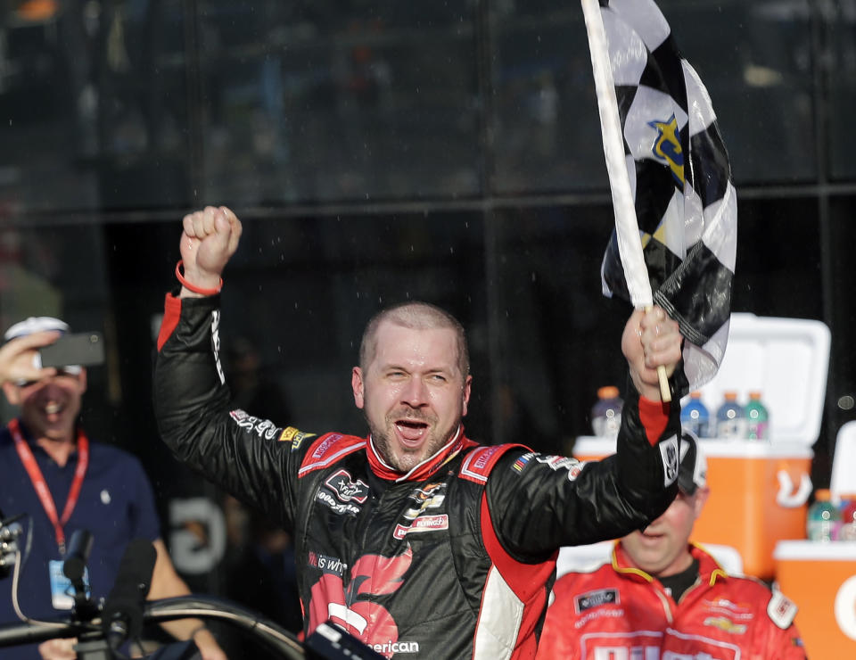 Michael Annett celebrates in Victory Lane after winning the NASCAR Xfinity series auto race at Daytona International Speedway, Saturday, Feb. 16, 2019, in Daytona Beach, Fla. (AP Photo/Terry Renna)
