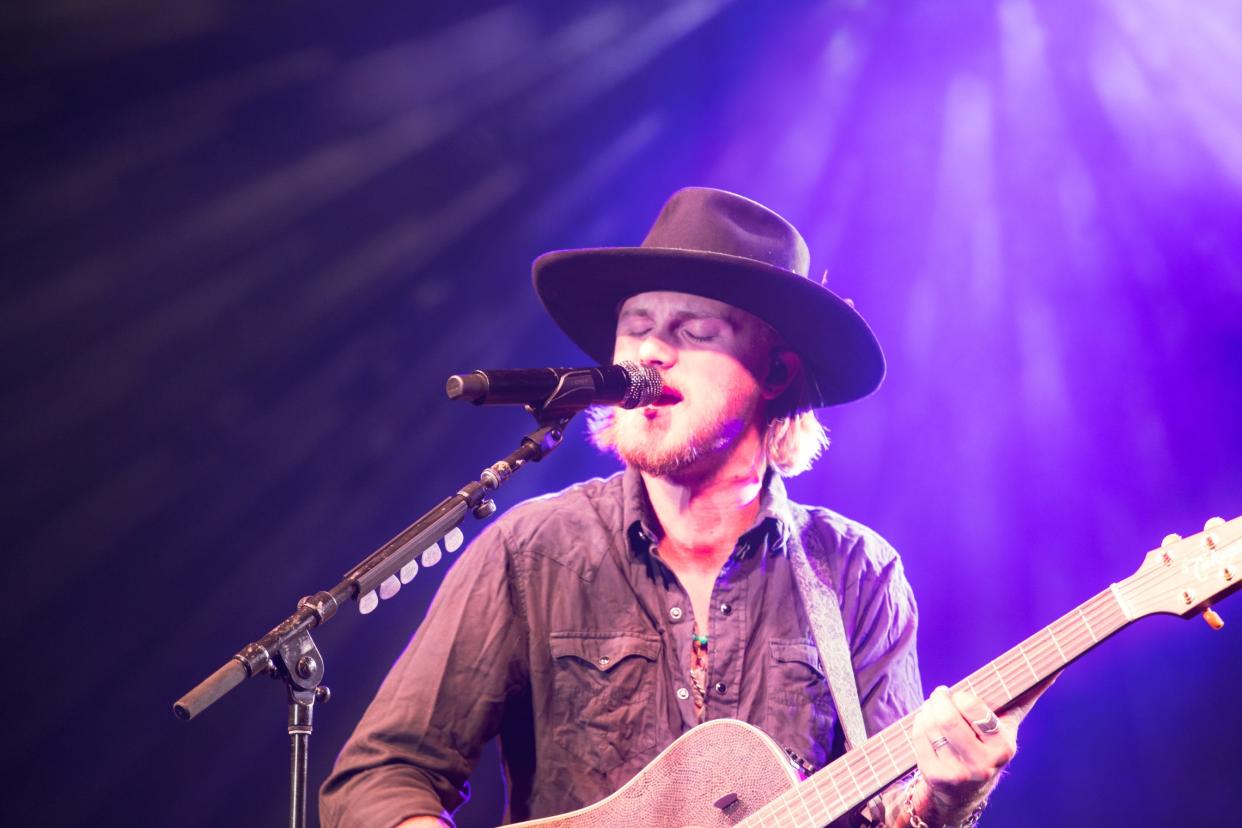 Jackson Dean performs Saturday at the Monroe County Fair grandstand.