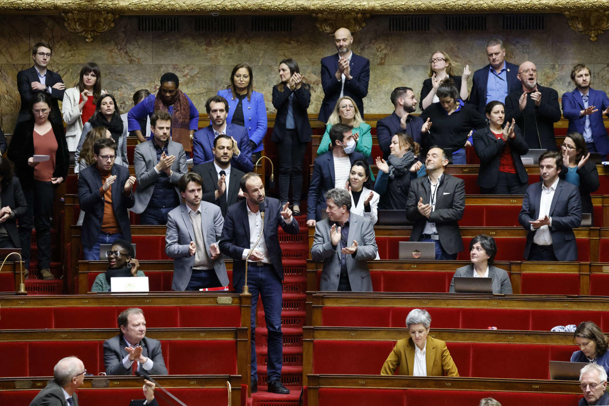 French leftist La France Insoumise (LFI) party Member of Parliament Manuel Bompard (C) speaks during a session to discuss the government's pensions reform plan at the National Assembly, in Paris, on February 16, 2023. (Photo by Ludovic MARIN / AFP)