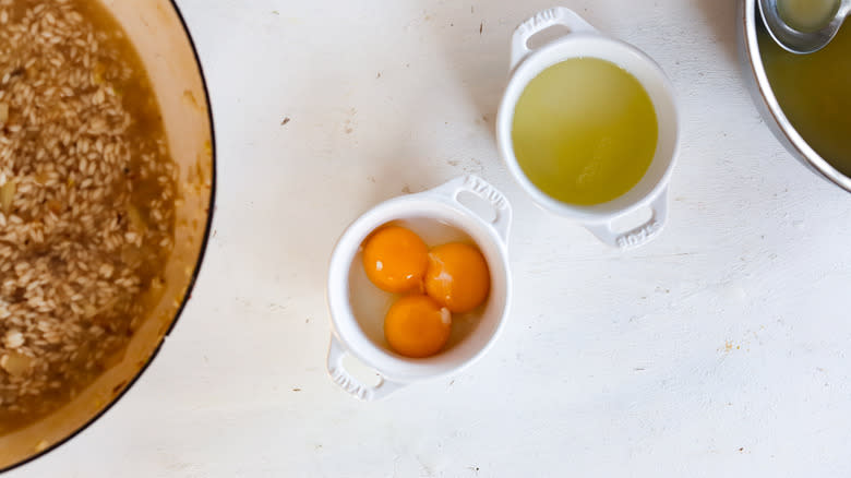 separated egg whites and yolks in bowls