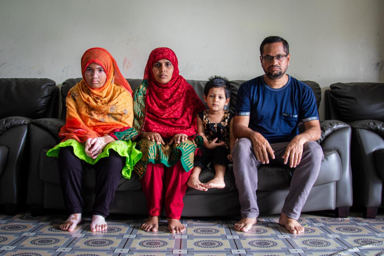 <span>Nurul Chawdury with his family in Port Moresby, waiting for resettlement in New Zealand.</span><span>Photograph: Godfree Kaptigau/The Guardian</span>