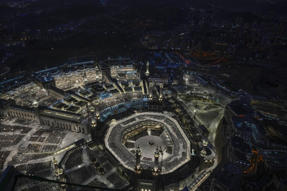 Muslim pilgrims circumambulate the Kaaba, the cubic building at the Grand Mosque, during the annual Hajj pilgrimage in Mecca, Saudi Arabia, Tuesday, June 11, 2024. (AP Photo/Rafiq Maqbool)