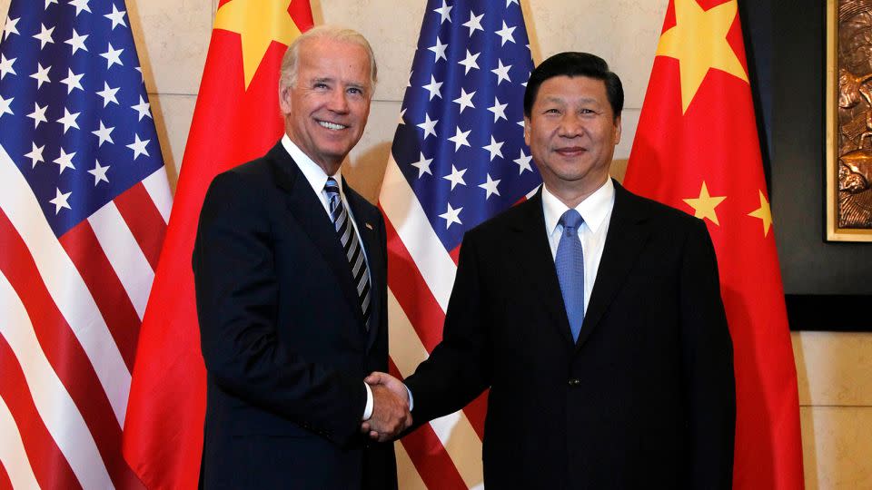 US Vice President Joe Biden with Chinese Vice President Xi Jinping before talks at a hotel in Beijing on August 19, 2011. - Ng Han Guan/AFP/Getty Images/File