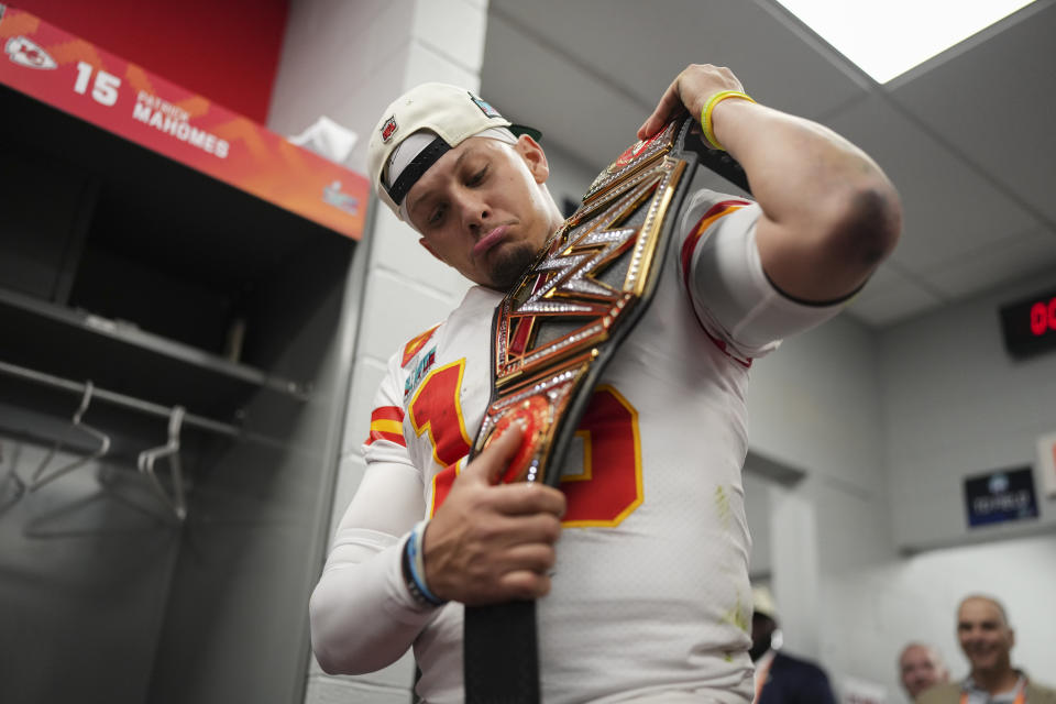 The WWE World Heavyweight Championship belt fits Patrick Mahomes just fine, especially after his gutsy Super Bowl LVII performance. (Photo by Cooper Neill/Getty Images)