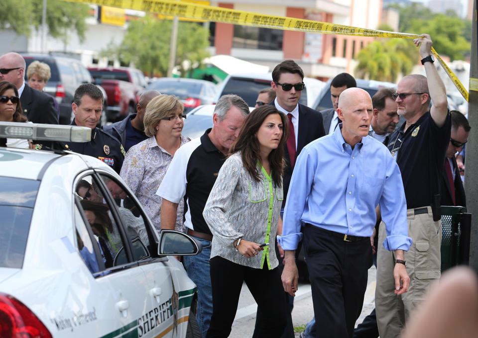 <p>Florida Gov. Rick Scott arrives on the scene near the nightclub where a mass shooting occured in Orlando, Fla., June 12, 2016. (Joe Burbank/Orlando Sentinel via AP) </p>