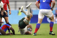 South Africa's Kwagga Smith falls after he was tackled during the Rugby World Cup Pool B game at the City of Toyota Stadium between South Africa and Namibia in Toyota City, Japan, Saturday, Sept. 28, 2019. (AP Photo/Christophe Ena)