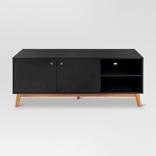 From Target's new home line, Project 62. Plus, <a href="https://www.target.com/p/58-guthrie-mid-century-modern-two-tone-media-stand-project-62-153/-/A-50752367#lnk=sametab" target="_blank">get free shipping and handling at Target</a> now through Dec. 23.&nbsp;