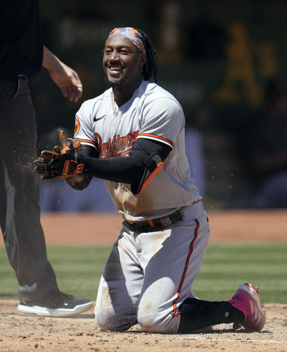 Baltimore Orioles' Jorge Mateo celebrates after hitting an inside-the-park home run during the second inning of a baseball game against the Oakland Athletics in Oakland, Calif., Sunday, Aug. 20, 2023. (AP Photo/Jeff Chiu)