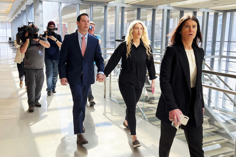 Former doctor William Husel with his wife, Mariah Baird, outside court, in Columbus, Ohio, on April 20. (Doral Chenoweth / The Columbus Dispatch/Pool via AP)