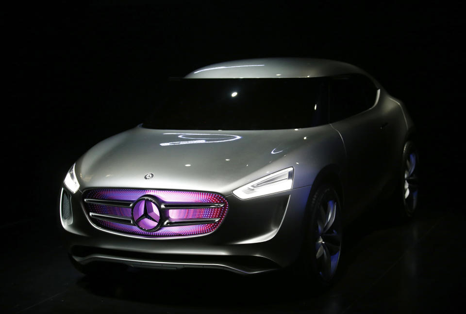 Mercedes-Benz's new Sport Utility Coupe concept car G-Code is seen at its unveiling event during the opening ceremony of Daimler AG's Mercedes-Benz research and development (R&D) centre in Beijing November 3, 2014. Daimler AG has opened a research and development centre in Beijing tasked with further tuning its Mercedes-Benz brand to wealthy Chinese tastes and closing the sales gap with Audi AG and BMW AG.   REUTERS/Kim Kyung-Hoon (CHINA - Tags: TRANSPORT BUSINESS)