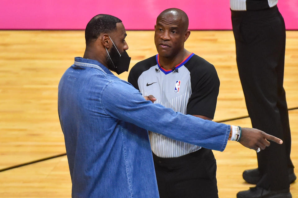 Official Tony Brown with LeBron James.