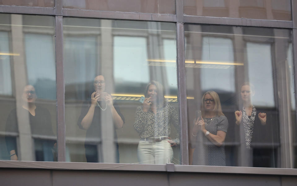 <p>Office workers look on from a building next to the Labour Party’s Headquarters in London, Britain June 9, 2017. (Photo: Marko Djurica/Reuters) </p>