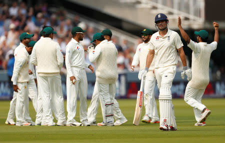 Cricket - England vs Pakistan - First Test - Lord's Cricket Ground, London, Britain - May 24, 2018 England's Alastair Cook walks off dejected after losing his wicket Action Images via Reuters/John Sibley