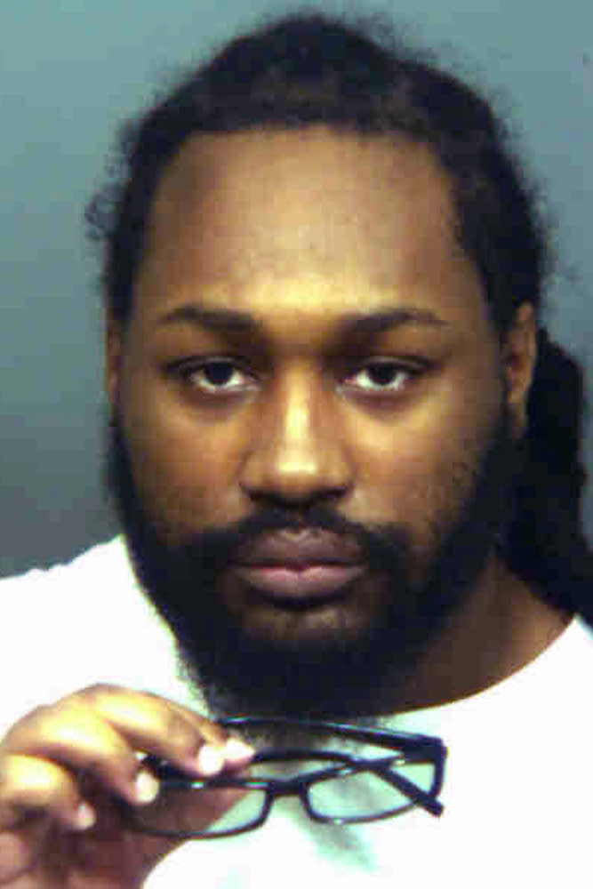 This photo provided by the state's attorney's office in Prince George's County, Md., shows Michael Ford, charged with attacking a Maryland police station while his two brothers videotaped the shootout, which led to an officer mistakenly killing an undercover detective. Opening statements are expected to begin Wednesday, Oct. 24, 2018, for Ford’s trial in the 2016 shooting death of Prince George’s County police detective Jacai Colson. (Prince George's County State's Attorney's Office via AP)