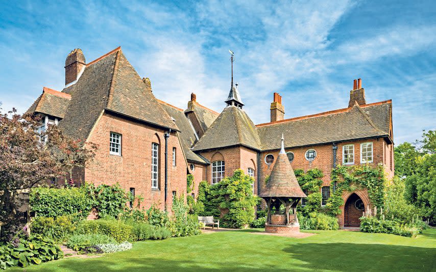 The gardens at Red House were once an orchard. They complement the austere architecture of the house, designed by Philip Webb - National Trust Images / Andrew Butle