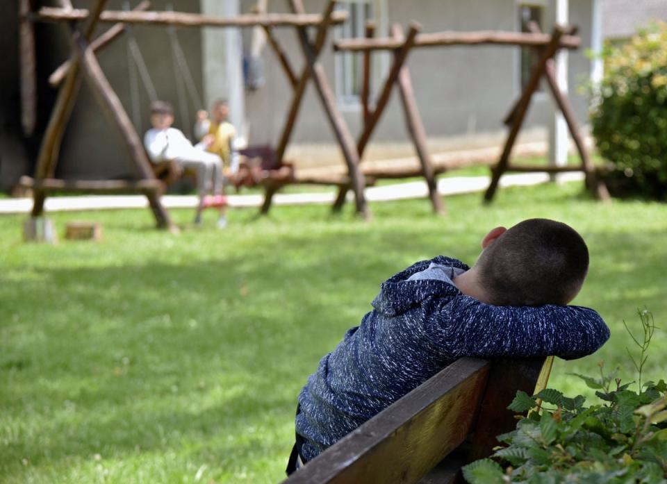 A child looks on during outdoor activities at the Lelechenya centre (Reuters)