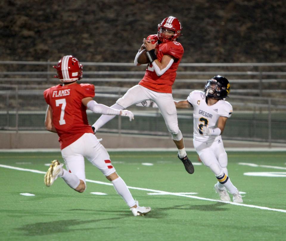 Lodi's Matthew Shinn jumps for the catch Friday night during the Homecoming game against Gregori High School at the Grape Bowl in Lodi on Friday, Sept. 23, 2022.