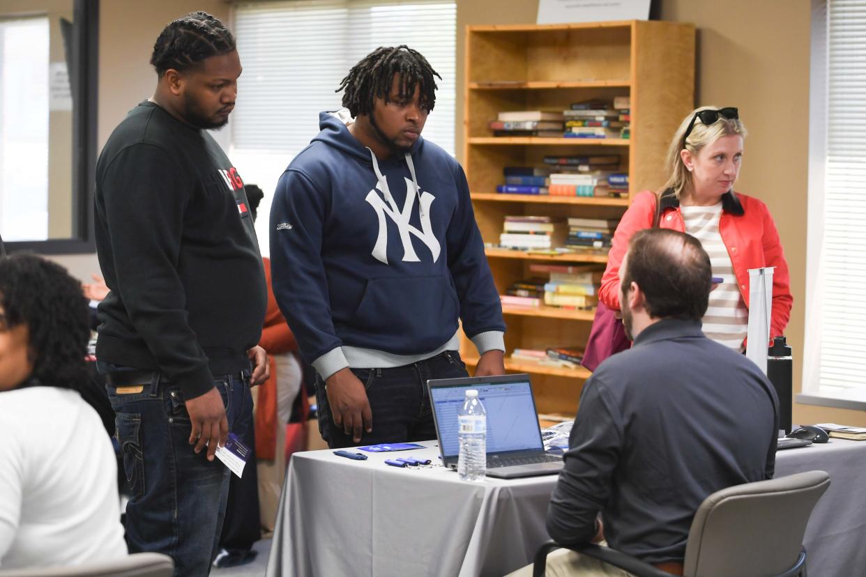 Attendees speak with BlueOval Recruiters during the Dept. of Corrections Job Fair at the TDOC Communty Resource Center in Jackson, Tenn., on Thursday, March 28, 2024.